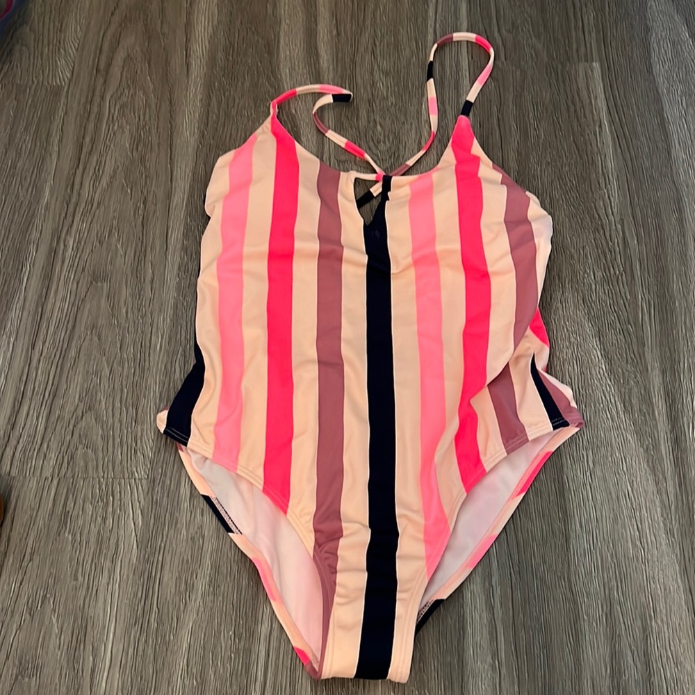 Woman’s size large bathing suit. Never worn.